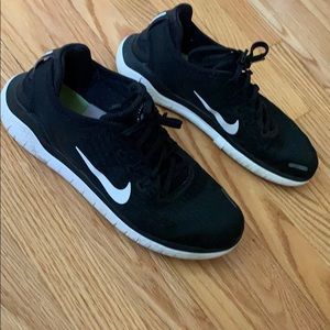 Black and white Nike Free RN